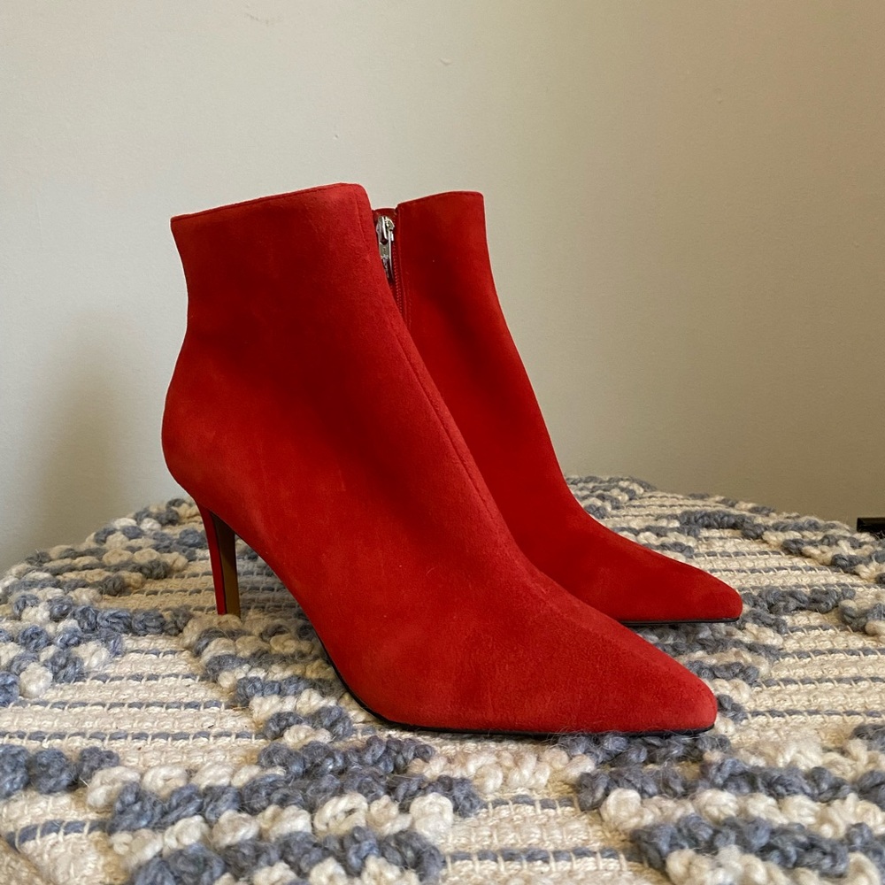 Brand new red heeled boots
